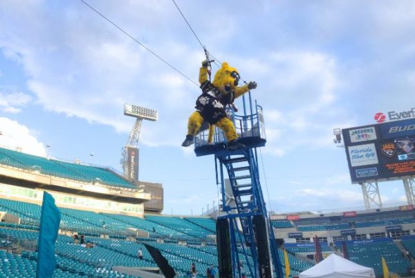 Football Mascot using the mobile zipline rental