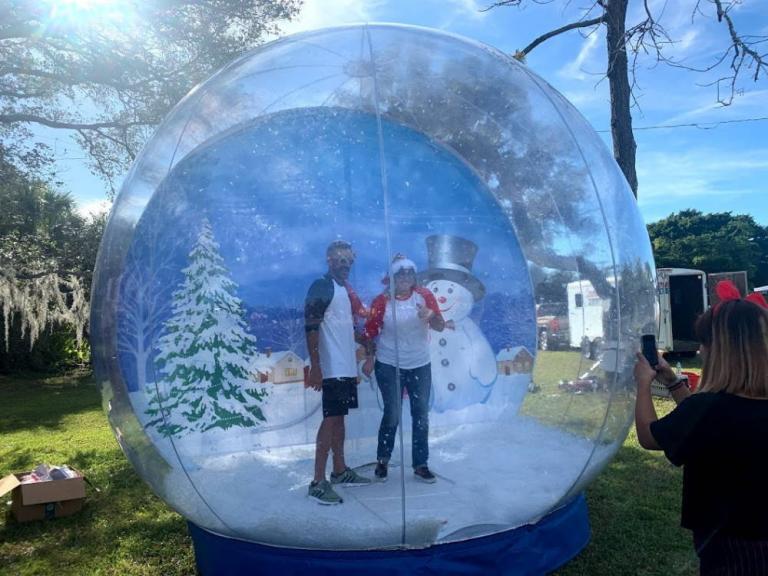 Interactive Snow Globe  Christmas Party Rentals  WalkIn Snow Globe